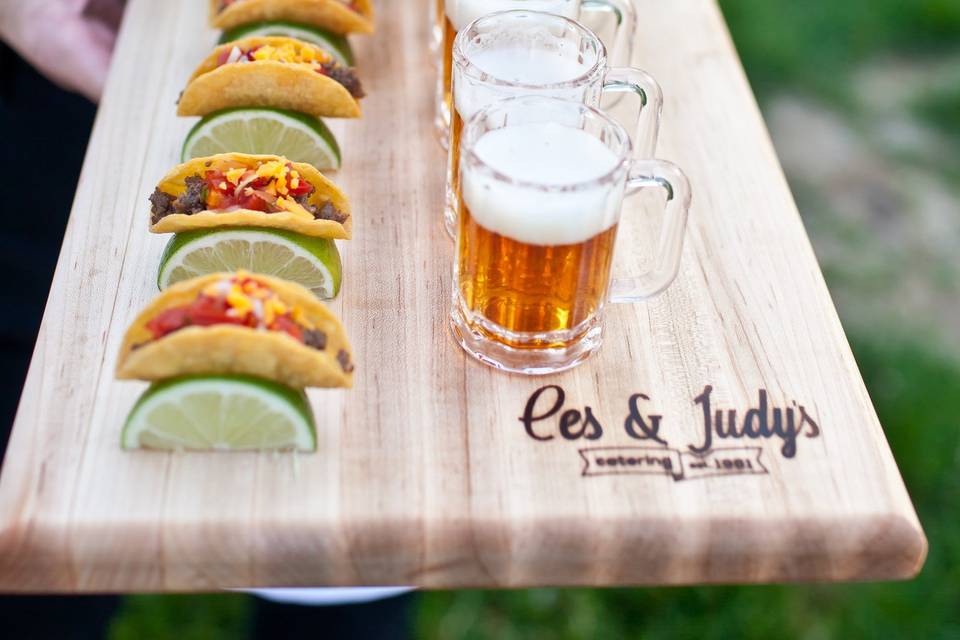 Miniature beer mugs and tacos