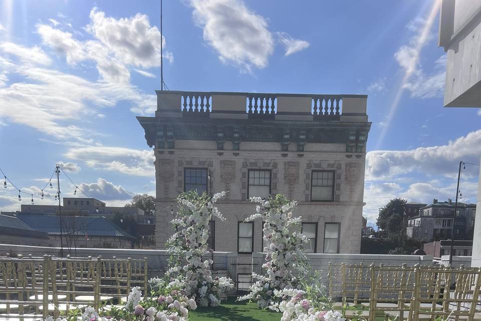 Aisle Flowers + Arch