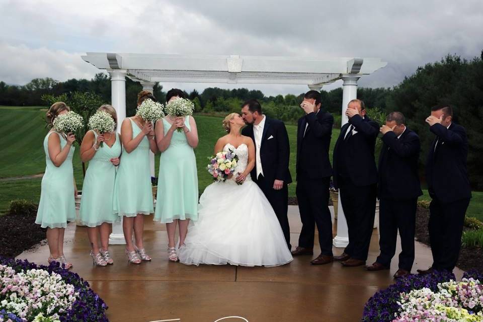 Newlyweds kissing