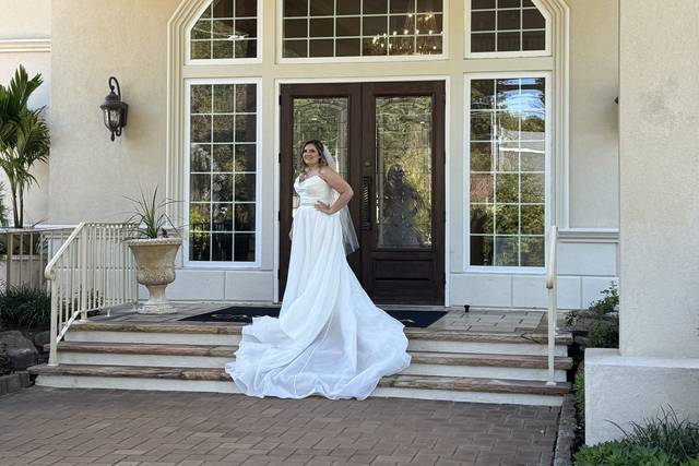 Bride at the front doors