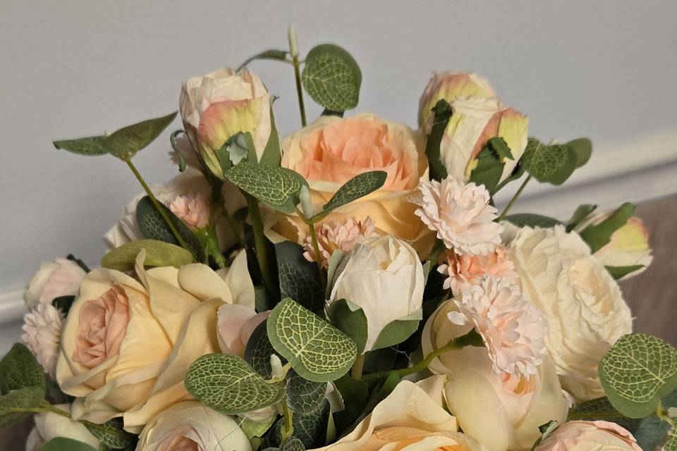 PEACH AND IVORY HAND BOUQUET