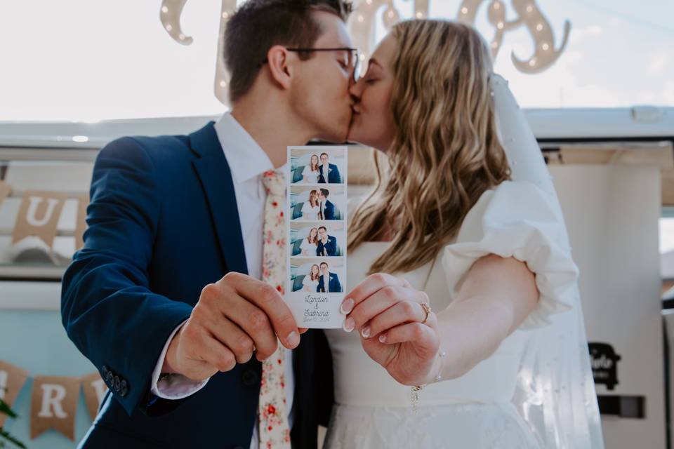 Newlyweds kissing