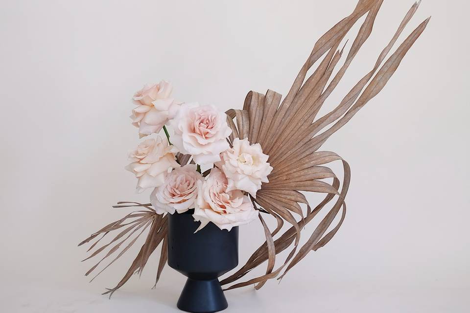 Blush roses and dried palms