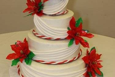 Vanilla Cake, White Buttercream Icing, Hand made Poinsettias and Fondant Drape for 250 Guests