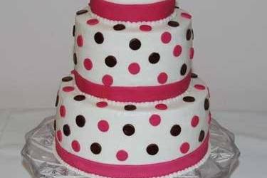 3 Tier Yellow Cake with White Buttercream Icing. Pink Bands and Black & Pink Dots