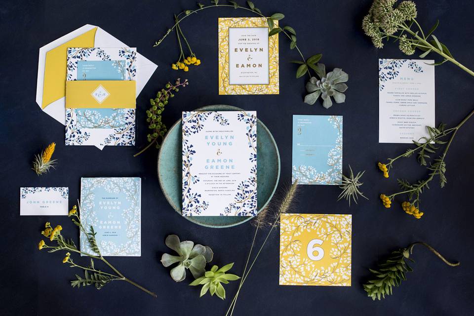 Hello Tenfold's vine wedding suite features modern fonts with romantic, swirling vines and bright pops of color. This suite is fully customizable, and we love it with touches of gold foil.