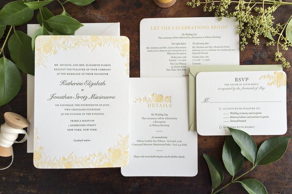 Vintage-inspired flowers adorn this classic wedding invitation suite called 