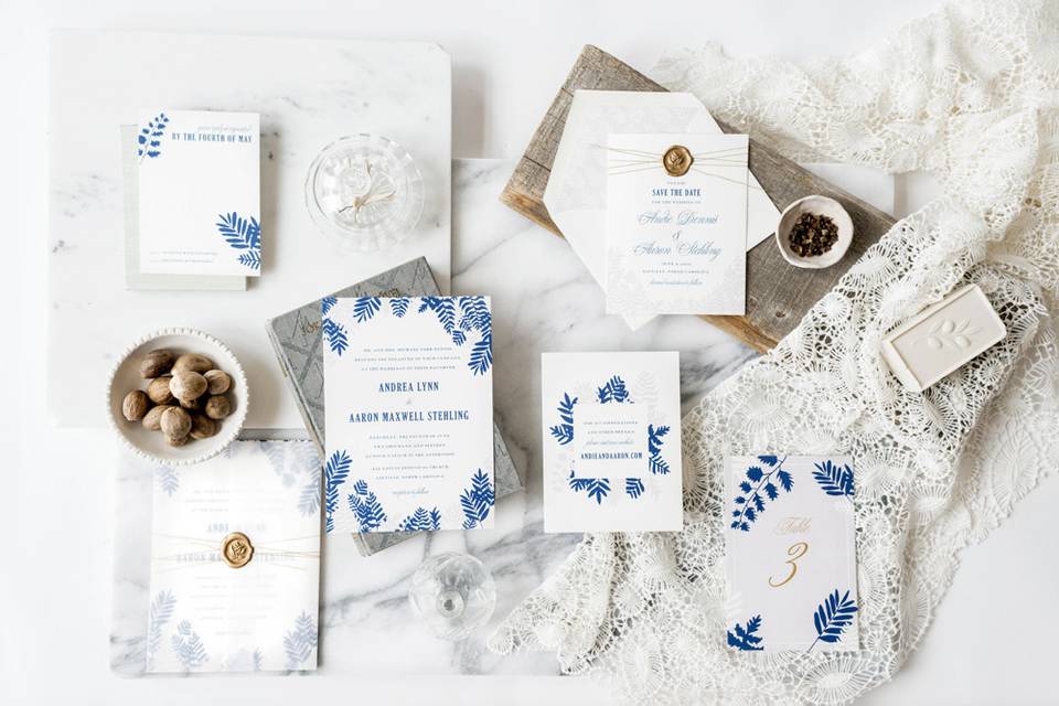 Hello Tenfold's Fern wedding invitations feature modern, botanical silhouettes and an unexpected color palette of blues, lavenders, and gold. We'd love to customize this suite for your event!