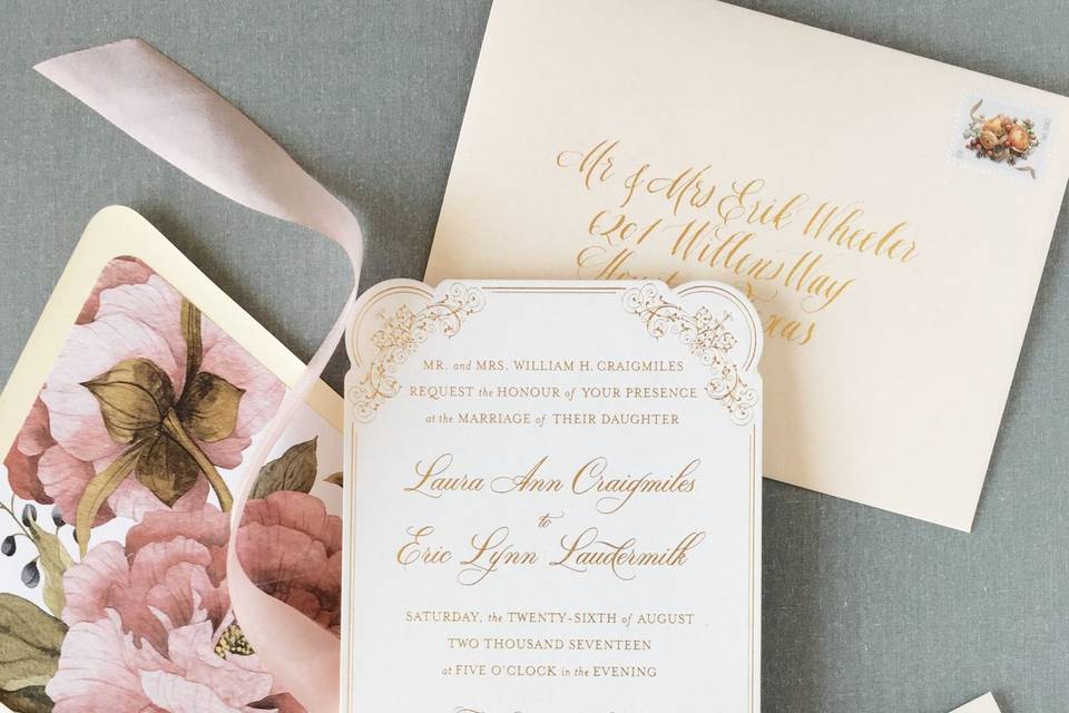 Gold foil invitation with die cut and floral envelope liner