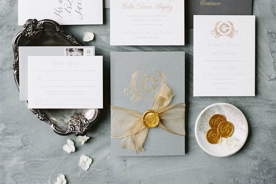 Gold foil invitation suite with grey linen backer and moody floral liner