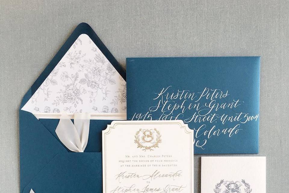 Silver foil invitation suite with vintage monogram and calligraphy accents