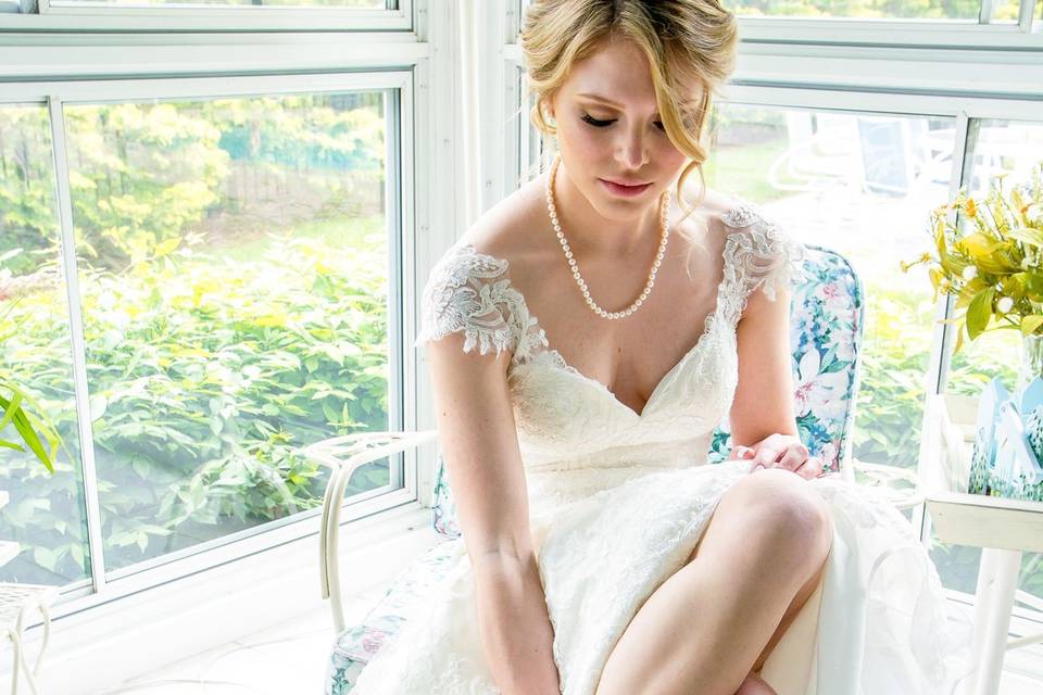 Bride putting on heels