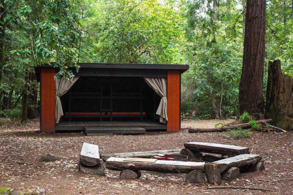 These cool structures are Adirondacks. We have 21 of them sprinkled throughout the property. Kids and adults love sleeping in them.