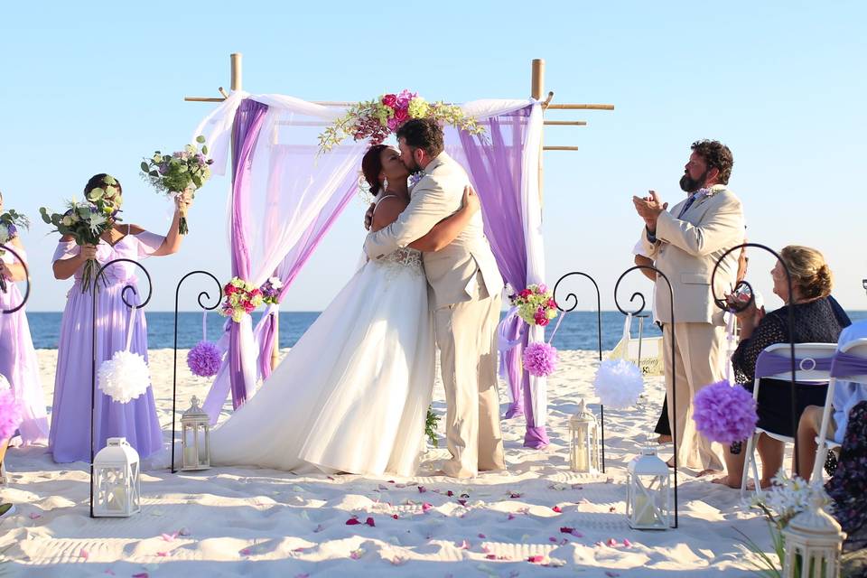 Beach wedding kiss