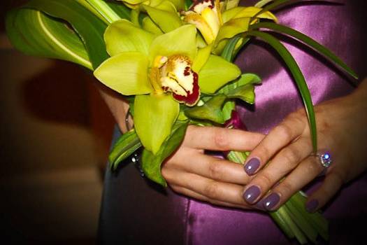 Elegant and uniquely styled bouquet of green cymbidium orchids.