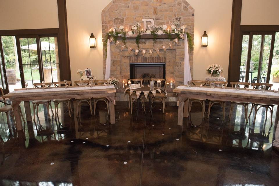 Head tables by the fire place. (Photo by Complete Indy.)