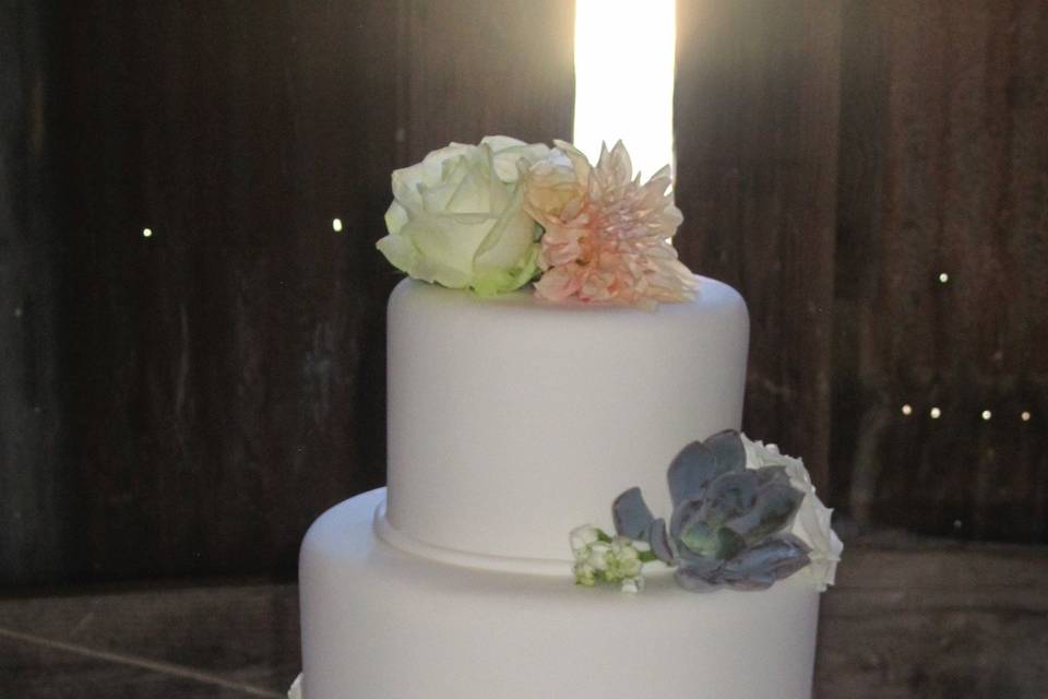 Wedding cake and cupcake station