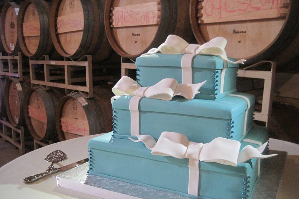3-tier wedding cake with striped middle layer