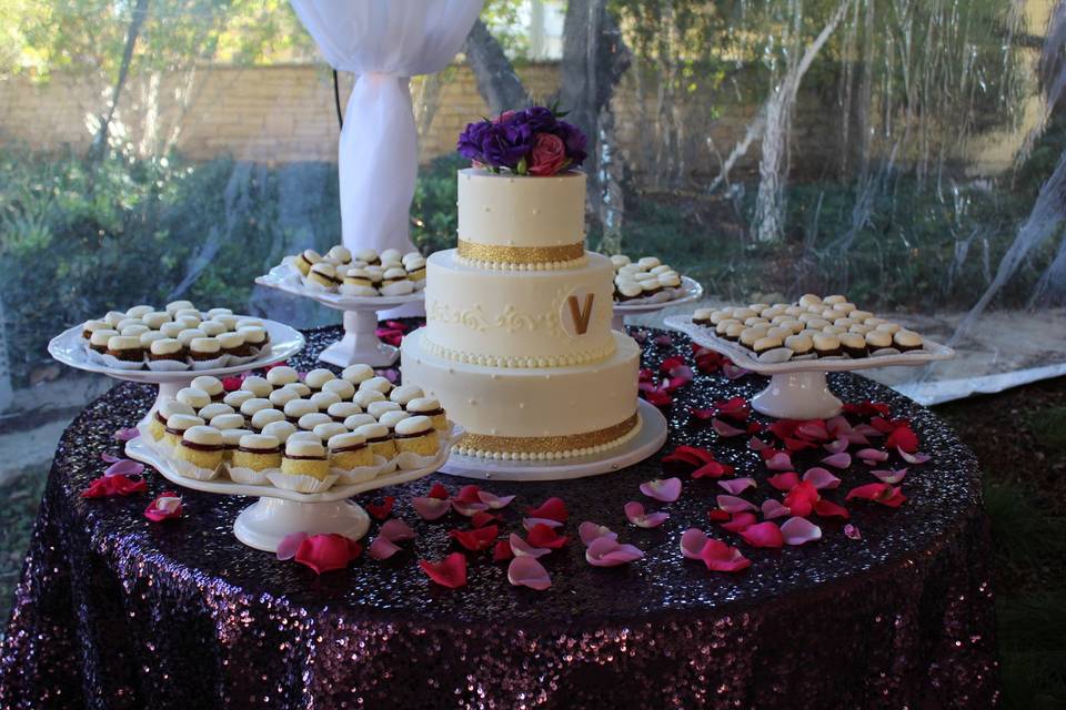 Wedding cake and cupcake station