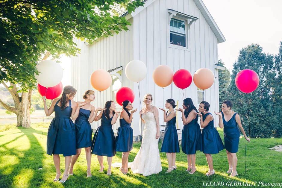 The ladies holding balloons