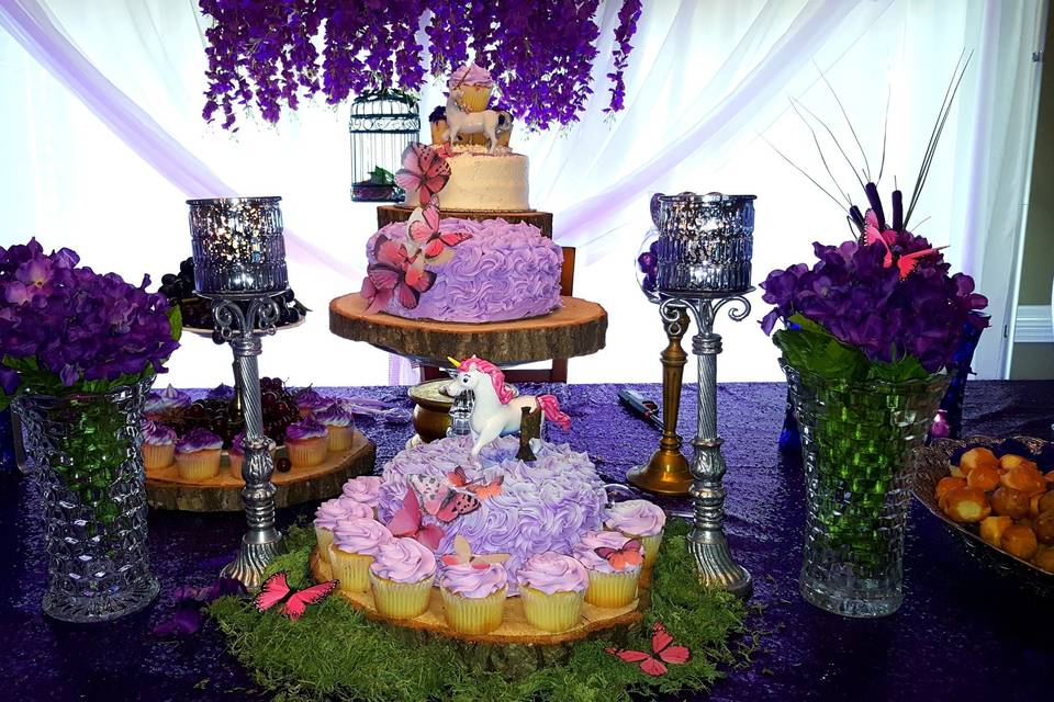 Wedding cake and cupcakes