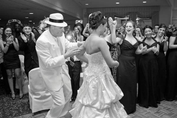 Couple and guests dancing