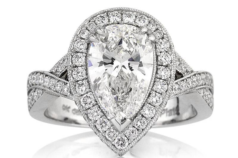 <b>3.14ctw Pear Shaped Diamond Engagement Anniversary Ring</b><br>
This perfect pear shaped diamond platinum engagement ring features diamond pave and elegant handmade milgrain accents.