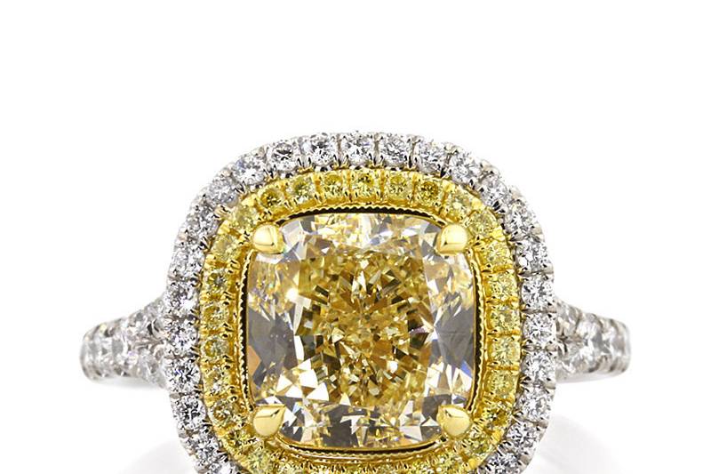 <b>4.77ctw Fancy Light Yellow Cushion Cut Diamond Engagement Anniversary Ring</b><br>
This delicious fancy yellow cushion cut diamond engagement ring features a fancy yellow halo and a white diamond halo.