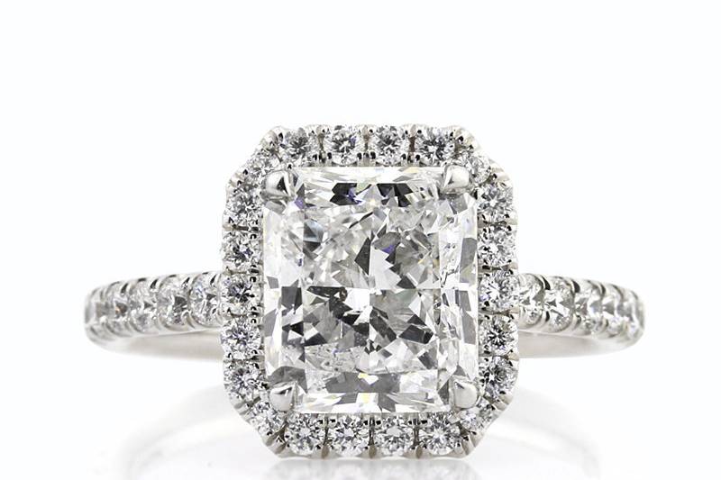 <b>4.28ctw Radiant Cut Diamond Engagement Anniversary Ring</b><br>
This exquisite radiant cut diamond halo ring has bright, white diamonds set all over including the connectors.