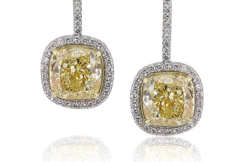 <b>8.72ctw Fancy Yellow Cushion Cut Diamond Earrings</b><br>
Mouth watering fancy yellow cushion cut diamonds are at the center of these delicious earrings making them a must-have!