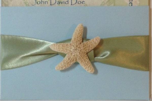 The Beach Shell
with sage ribbon knot and real starfish
Also available/matching:
Engagement notices
Save The Date notices
Bridal Shower invitations
Bachlorette Party invitations
Placecards (for guests and/or food)
Water Bottle wraps
Wine/Champagne Bottle wraps
Menu cards
Stem Glass *BLING*
Programs
Thank You notes