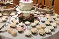 Wedding cake and cupcakes