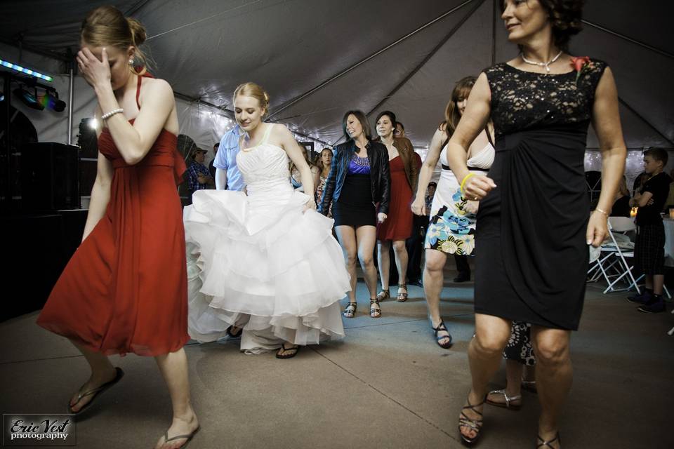 Guests and bride dancing