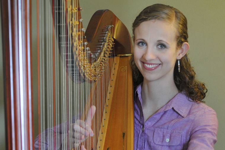 Smiling harpist