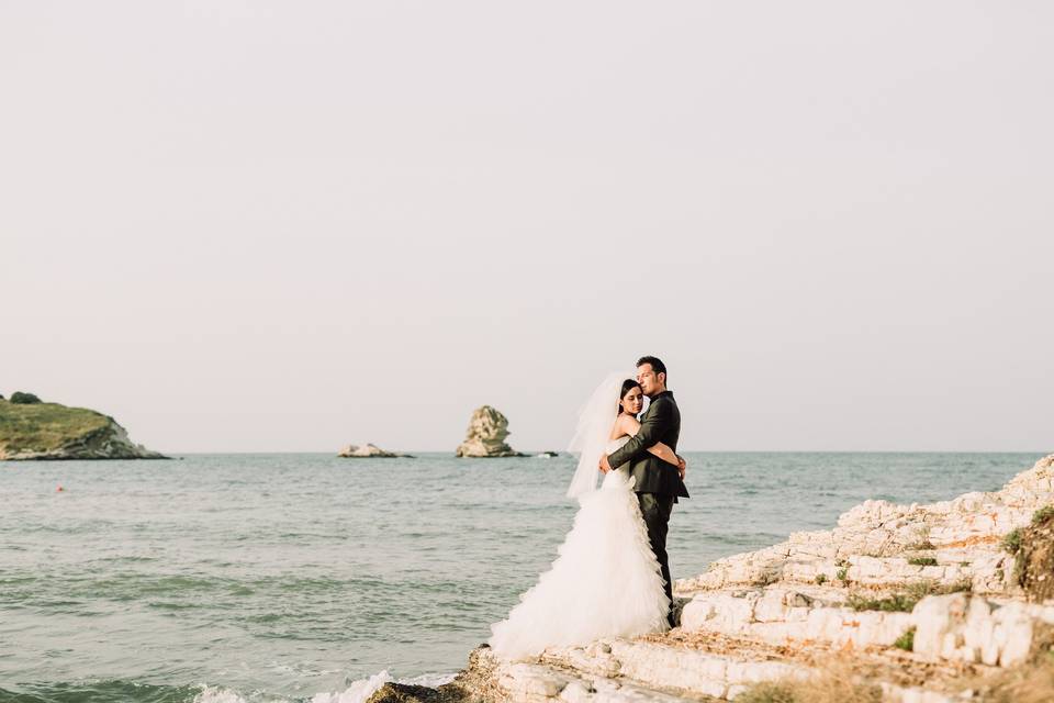 Newlyweds by the sea