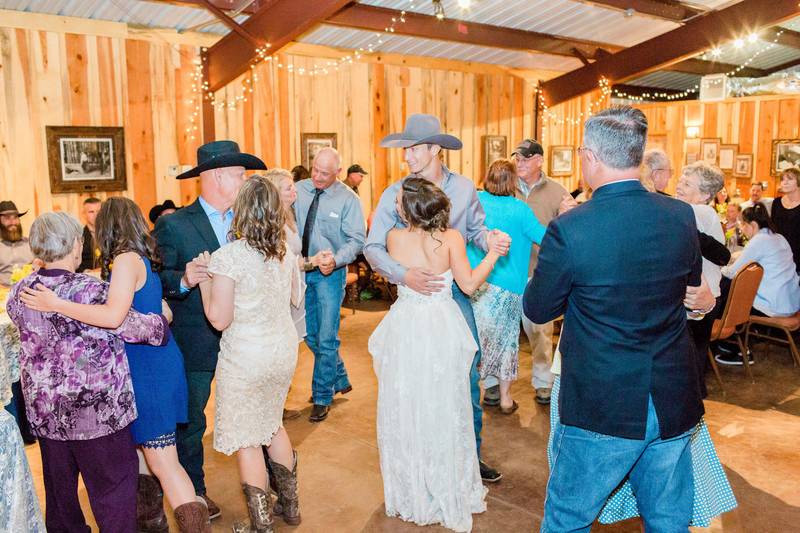 Couple dancing with the guests