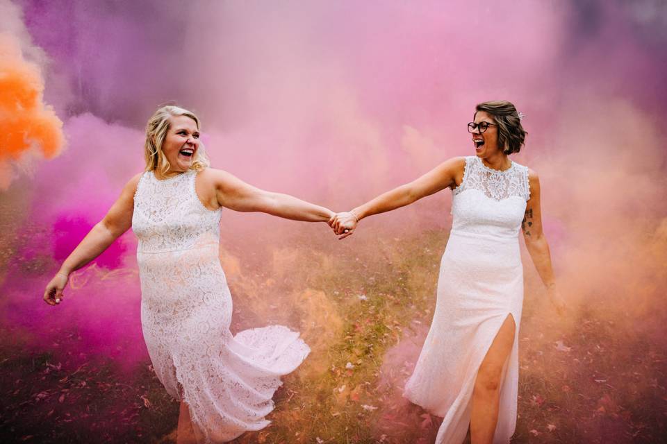 Pink smoke with 2 grooms