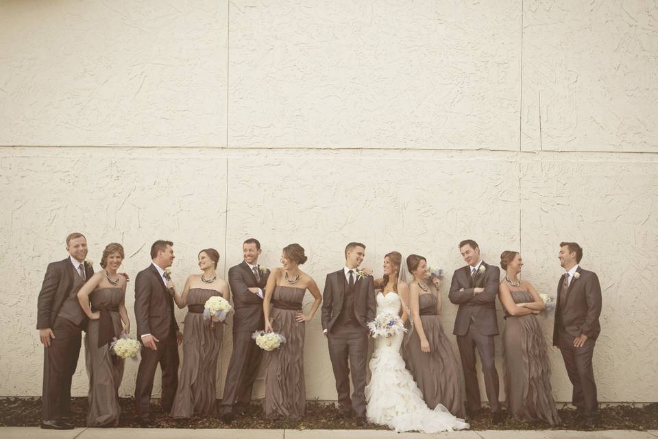 The couple with the bridesmaids and groomsmen