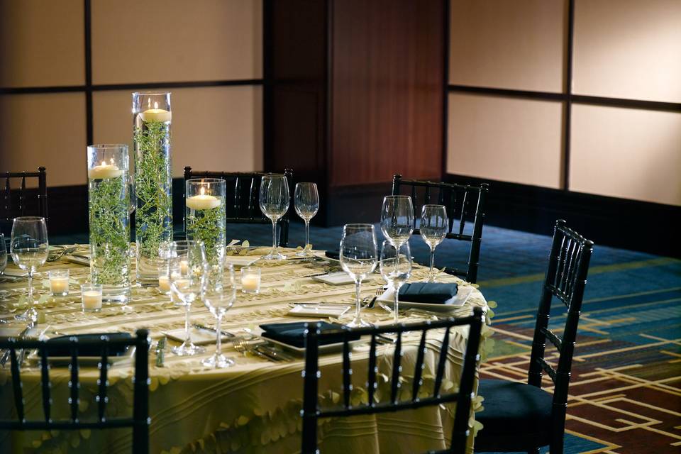 Round table setting and floral centerpiece