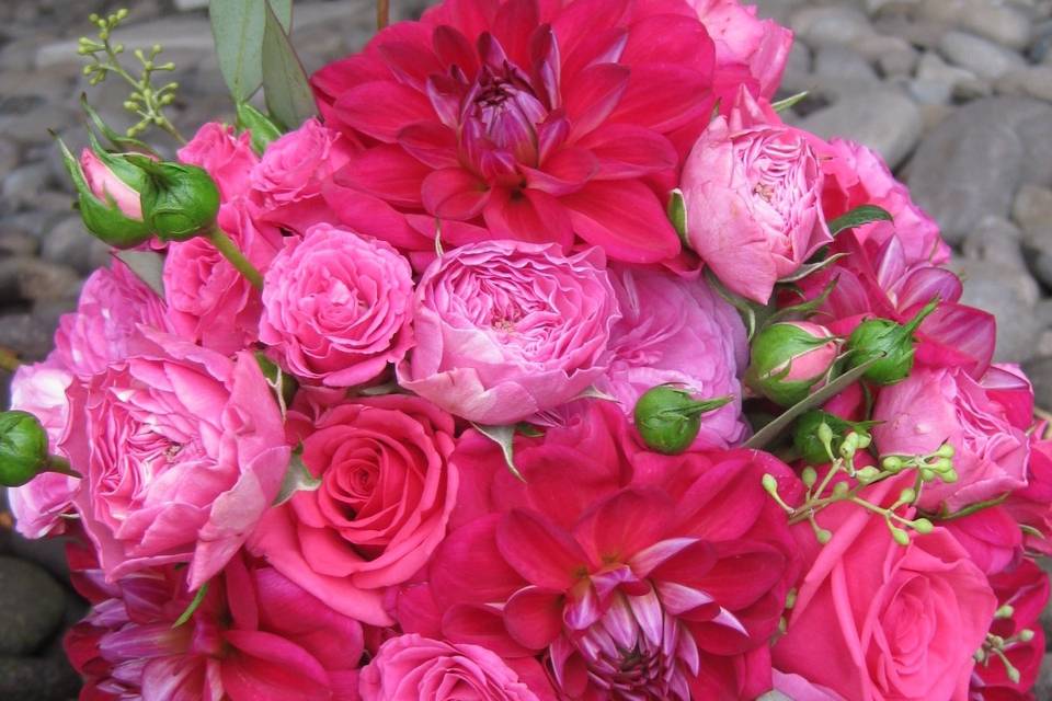 Bridal bouquet in shades of pink including dahlias and garden roses