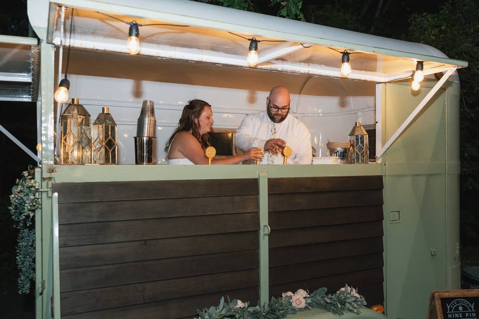 Couple Pouring Drinks