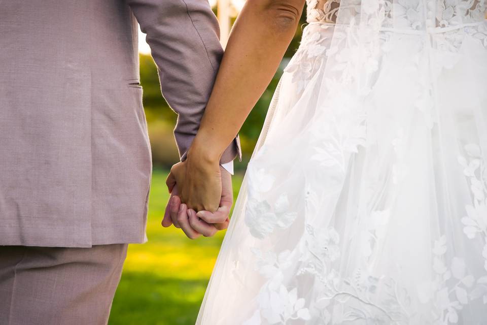 Lovingly holding hands