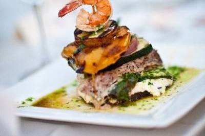 Pure joy tower of seared ahi and grilled farmer’s market veggies and potato, basil oil and beet cream, prawn garnish