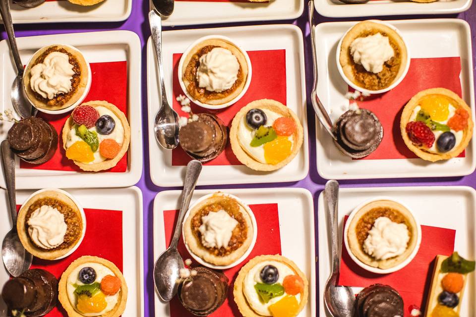 Trio of desserts: mini fudge 3 tier wedding cake, berry tart & tiny pecan pie