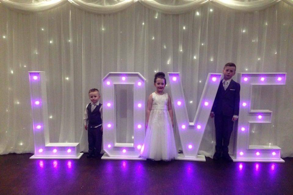 Giant love letters in purple at Blancos hotel, port talbot