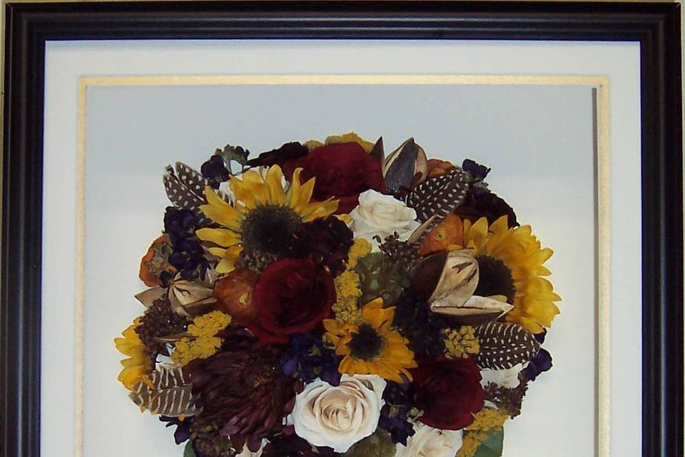This Autumn bouquet was framed in black with antique white backing and gold accent mat. Classic and Beautiful!