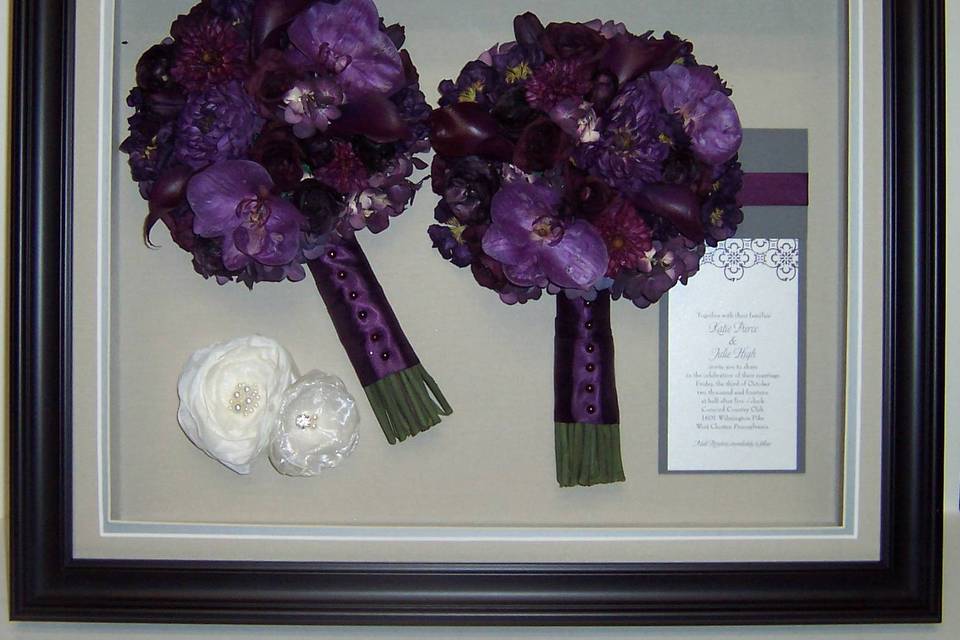 This gorgeous cascading bouquet is showcased in a high-end Larson Juhl frame with personalization.