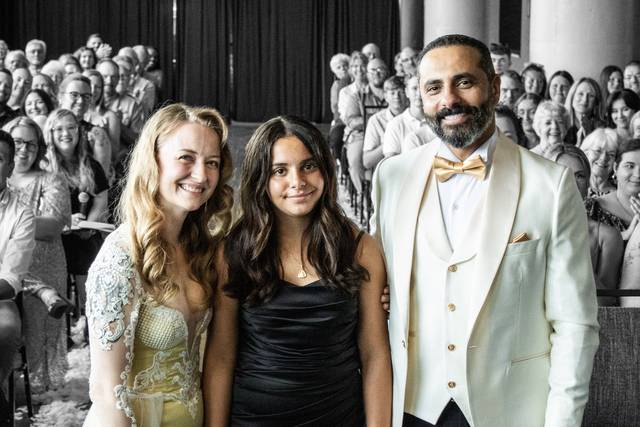 Bride, groom, child, audience