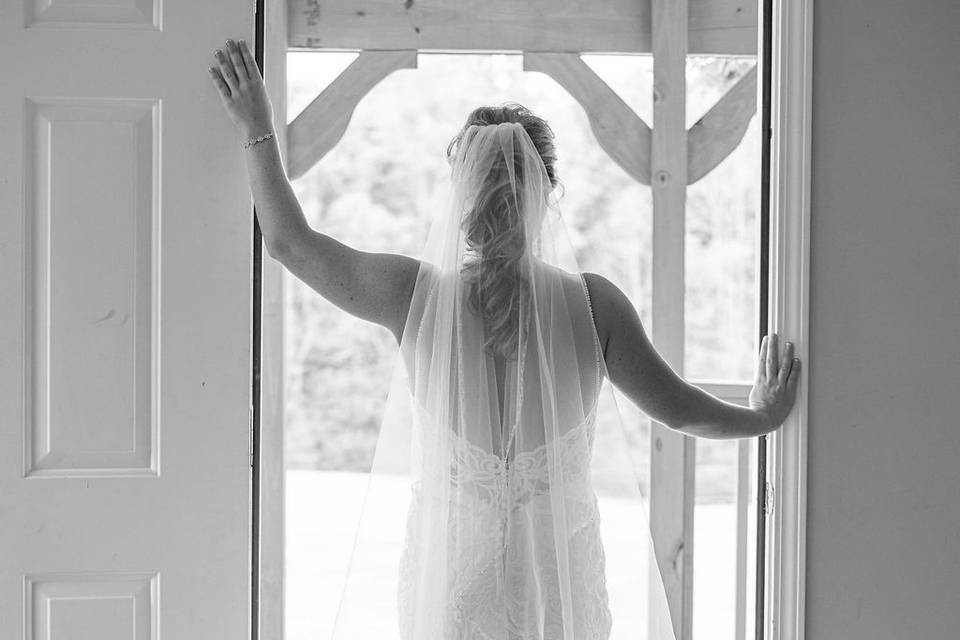Bride looking out the door