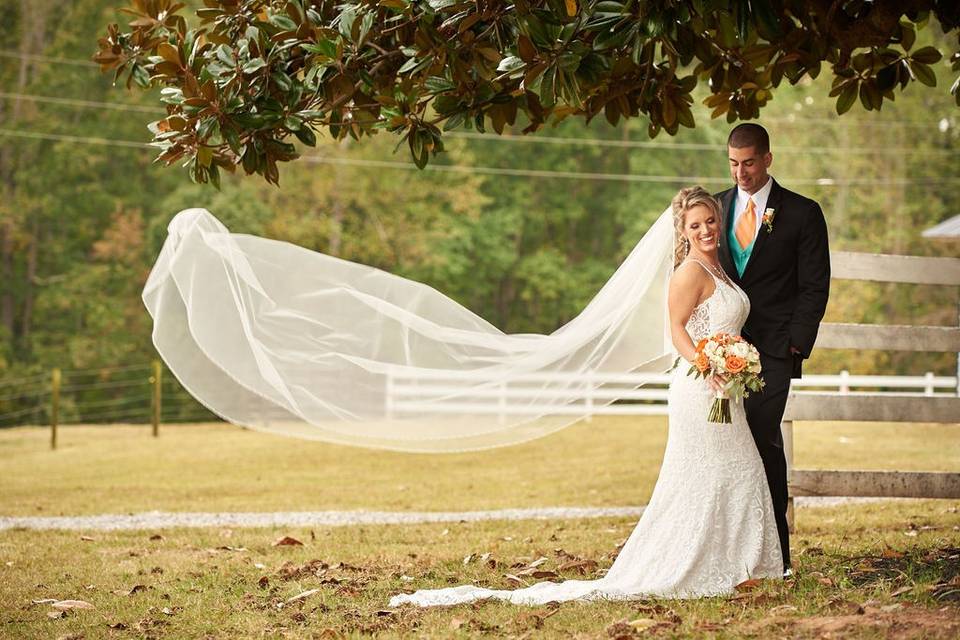 Couple by Magnolia Tree